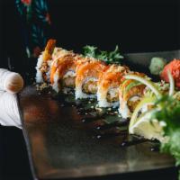 Crazy Roll* · Shrimp tempura roll inside, salmon and eel sauce on top.