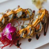 Delicious Roll* · Crab, cream cheese, avocado, cucumber, spicy tuna inside. Deep fried and topped with spicy m...