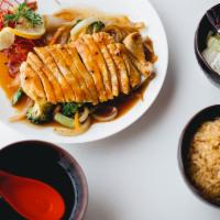 Chicken Teriyaki Dinner · Served with miso soup, house salad, steamed vegetables and your choice of steamed or fried r...