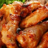 Jade Wings · Cooked wing of a chicken coated in sauce or seasoning.