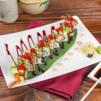 Guru Roll · Shrimp tempura, cucumber, topped with eel, avocado, scallion, red and black caviar, eel sauce.