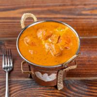 Chicken Tikka Masala · Marinated cubes of grilled chicken in a creamy tomato sauce.