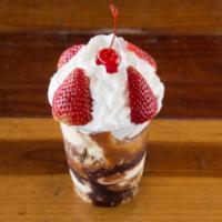 Sundae · 2 vanilla ice cream scoops topped with fresh strawberries, nut mix, chocolate, caramel, whip...