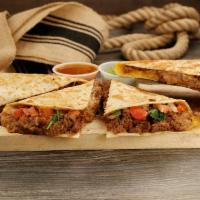 Build Your Own Quesadilla · Your choice of meat, additional selection with mixed cheese, diced tomatoes, chopped cilantr...