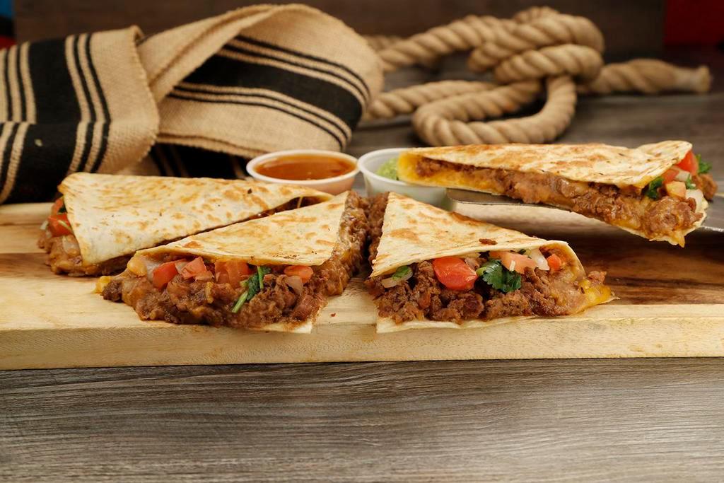 Build Your Own Quesadilla · Your choice of meat, additional selection with mixed cheese, diced tomatoes, chopped cilantro and onions on flour tortilla.
