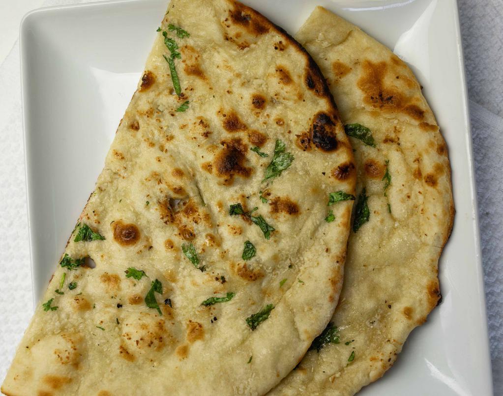 Garlic Naan · All-purpose flour bread cook with garlic and clay oven.