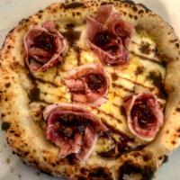 Summer Pizza · Mozzarella, French Brie cheese, figs jam, prosciutto di Parma drizzled with fig balsamic vin...