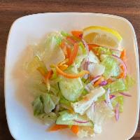 Indian Salad · Medley of fresh onions, tomatoes, cucumbers, cauliflower, carrots, and bell peppers in a hou...