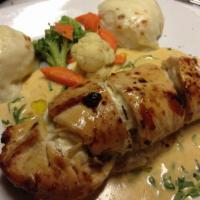 Chicken Breast Stuffed with Sweet Plantains · Chicken breast stuffed with sweet plantains and cream cheese in  brandy sauce.