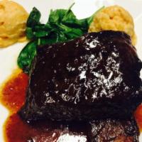 Short Ribs el Diablo · Beef short ribs in tamarind sauce with spicy chipotle mashed potatoes.