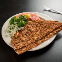 29. Lahmacun · Meat pie, Anatolia's version of ancient Turkish meat pie with ground lamb, topped with parsl...