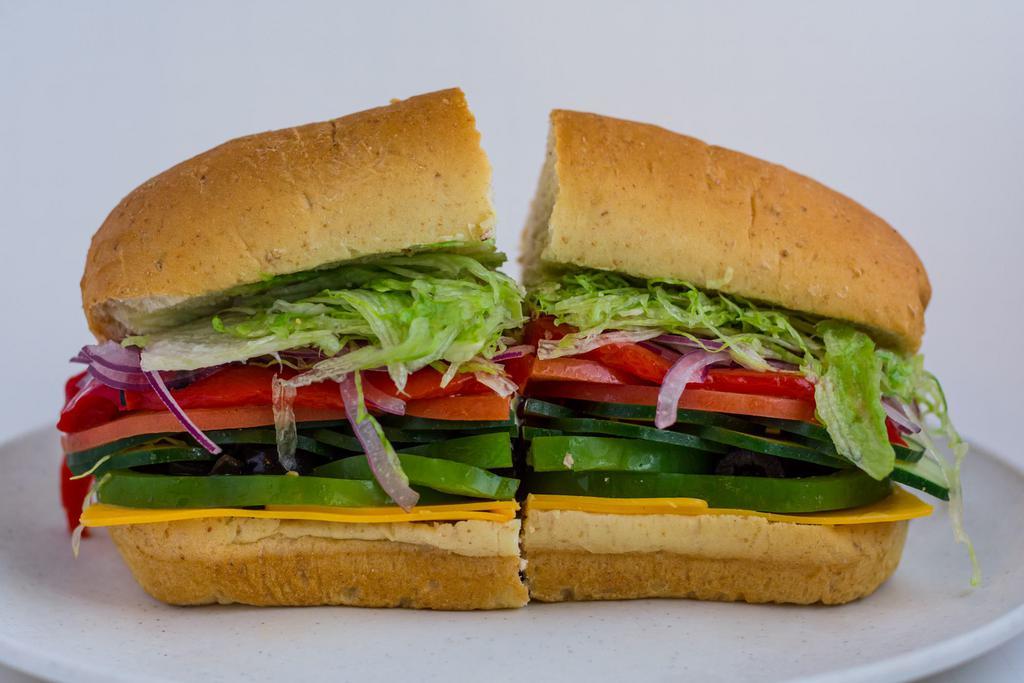 13. Veggie Sub · Lettuce, tomato, onions, green peppers, cucumbers and black olives.