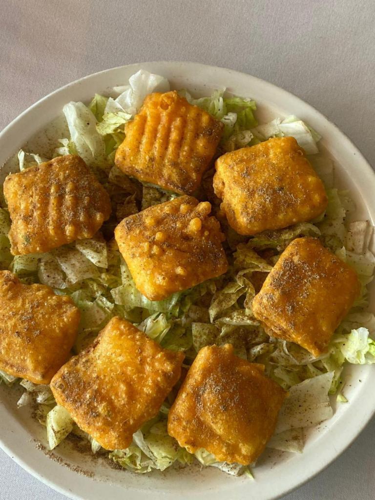 3. Eight Piece Paneer Sandwich Pakora · Pieces of homemade cheese dipped in garam or chick pea flour and deep-fried.