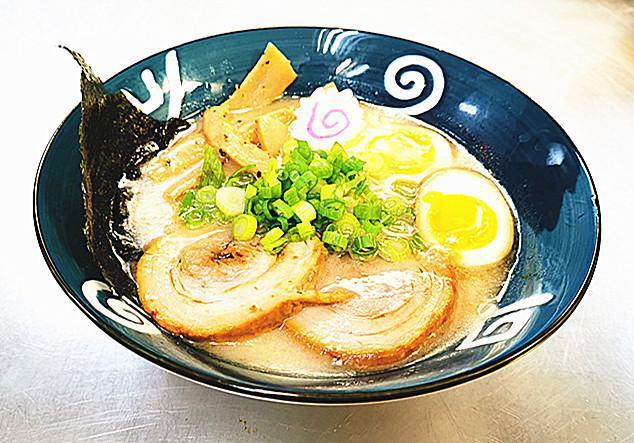 Tonkotsu Ramen  · Tonkotsu pork broth, in straight noodles with homemade Roast pork, menma, green onion, soft boiled egg, seaweed chips.