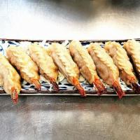 Fried Shrimp Dumpling  · 8 pieces. 
Shrimp & pork w. cabbage