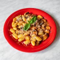 Gnocchi Sausage and Mushrooms · Potato and flour dumplings tossed with Italian sausage and baby bella mushrooms, garlic oliv...