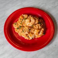 Shrimp and Peas Risotto · Arborio rice tossed with garlic olive oil shrimp and sweet peas. Homemade tomato basil sauce...
