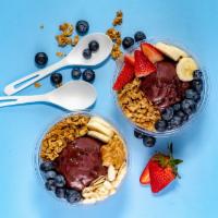 The Nuts · Organic Acai topped with Organic Granola, Fresh Strawberries and Bananas, Peanut Butter, Hon...
