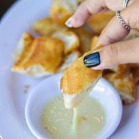 Chinese Fried Breadstick · Crispy fried breadstick served with sweet condensed milk.
