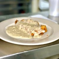 Chicken Fried Steak · Comes with chicken gravy. Served with choice of baked potato or steak cut fries and a side s...