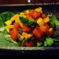 Poke Salad  · Hot and spicy. Tuna or salmon with seaweed salad, spring mix, mango and avocado. 