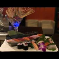 Sushi and Sashimi Deluxe  · 9 pieces sushi. 15 pieces sashimi with spicy tuna roll or tuna roll. 