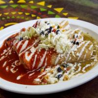 Enchilada Sonora Style Plate · 3 enchilada (green, red or mole sauce) topped with lettuce, queso fresco, corn salsa and sou...