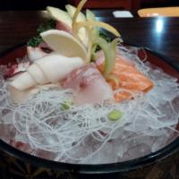 Sashimi Combo 12pc · Chef's selection. Served with miso soup and salad.