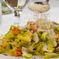 Insalata Classica di Cesare · Chopped romaine with croutons, Parmesan and anchovies.