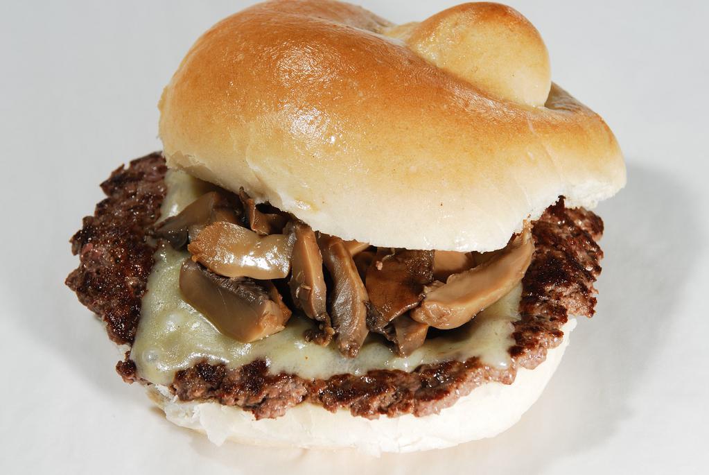 Mushroom Swiss Burger · Ground Steak topped with Swiss cheese and sauteed mushrooms on a hard roll. Served with steak sauce.