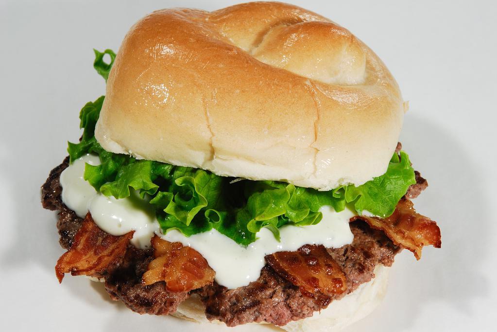 Bacon Bleu Cheeseburger · The ground steak burger topped with crispy bacon, bleu cheese dressing.