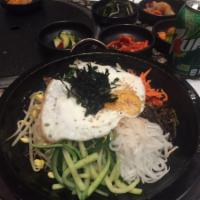 Stone Pot Bibimbap (돌솥비빔밥) · Steamed rice, cooked vegetables, fried egg and chili paste. Served warm. (Vegetarian option)