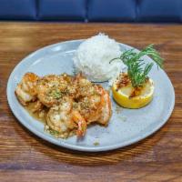 Scampi Shrimp · Black tiger shrimp, garlic, butter and lemon served with jasmine rice.