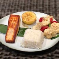  Grilled Salmon · Grilled salmon with house sauce, cauliflower, green beans and bell peppers served with jasmi...