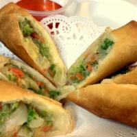 Egg Rolls (3) · Fried rolls stuffed with cabbage, celery, carrot and glass noodle. Served with sweet and sou...