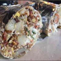 Bacon Breakfast Burrito · Eggs, bacon,  cheese, sour cream and red potatoes.