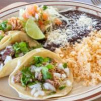 MEXICAN TACO PLATE CARNE ASADA · SERVED ON CORN TORTILLAS 3 SOFT TACOS  STEAK 
REFRIED BEENS.RICE.PICO DE GALLO .LIMES. ONION...