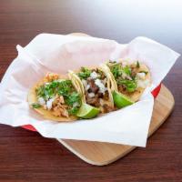 3 STEAK CARNE ASADA SOFT TACOS · ....served with diced onions, cilantro ,limes