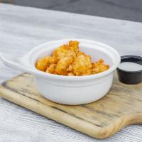 Cheese Curds  · About as Wisconsin as it gets. We beer batter and deep-fry these delicious clock shadow crea...