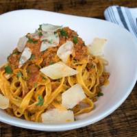 Bolognese · Our Bolognese sauce is sauteed to perfection and served over rigatone.