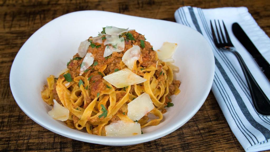Bolognese · Our Bolognese sauce is sauteed to perfection and served over rigatone.