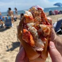 Lobster Roll · Fresh picked Nova Scotia Lobster, Hot Drawn Butter, with light mayo on a toasted bun. Colesl...