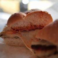 Chicken Parm Sandwich · Pan-fried chicken cutlet, sharp provolone cheese and marinara on a braided roll.