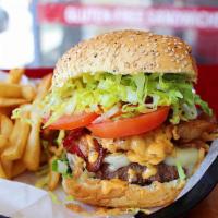 Kickin' Crunch Burger · 1/2 Angus beef, cheddar cheese, bacon, spicy kicking' bayou sauce, crispy onions, lettuce & ...