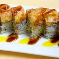 S11. Dancing Crab Roll · Shrimp tempura, cucumber, cream cheese, and tempura crab meat on top with special sauce.