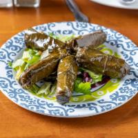 Stuffed Grape Leaves · Grape leaves filled with rice and herbs.