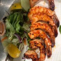 Shrimp Kebab · 7 jumbo shrimp seasoned and char-grilled on skewers served with rice or french fries.