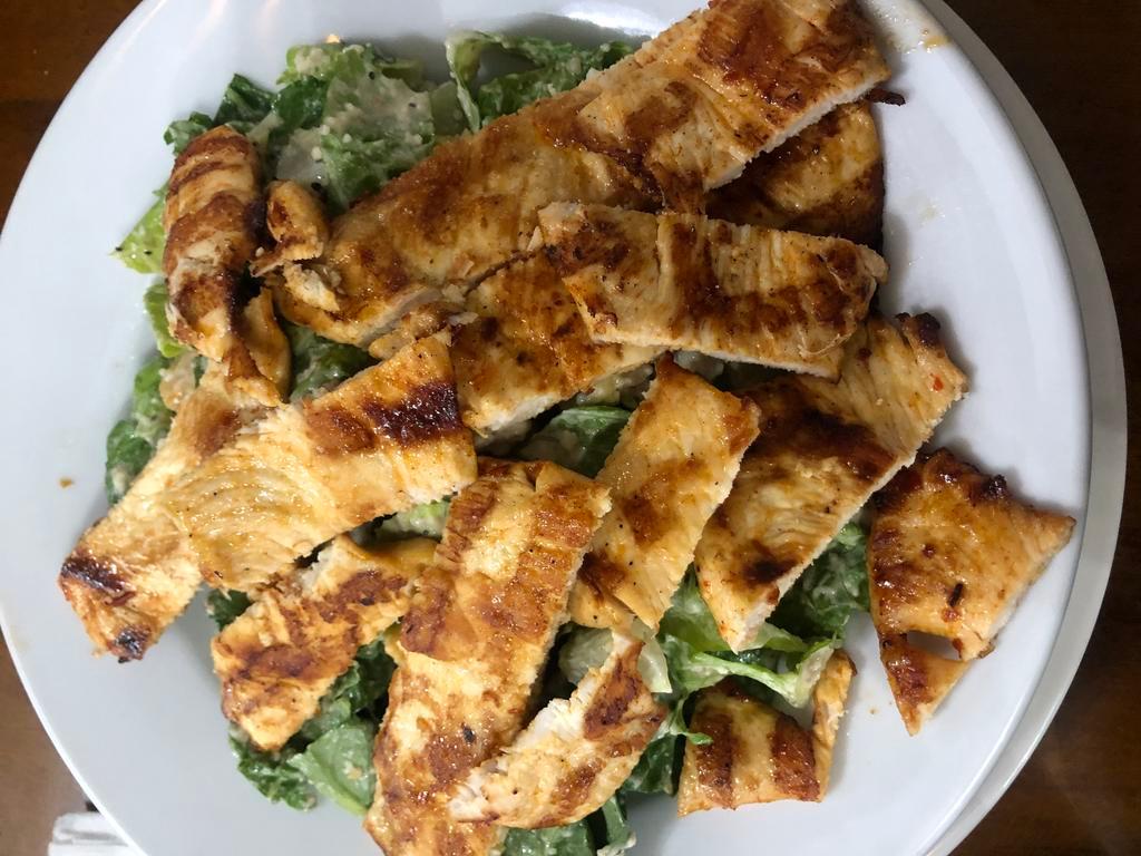  Caesar Salad · Large. Lettuce, croutons, parmesan cheese tossed with caesar dressing.