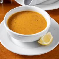 Lentil Soup · Savory lentil soup, chickpeas and a mixture of tomato sauce.
