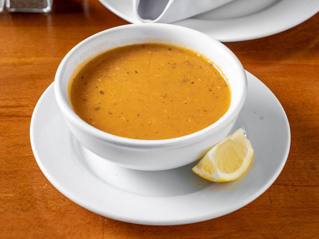 Lentil Soup · Savory lentil soup, chickpeas and a mixture of tomato sauce.
